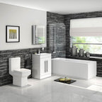 The iBathUK Arvon Shower Bath Suite features a straight bathtub with glass screen, gloss vanity basin unit with mirror, close coupled toilet set, combined toilet and sink unit—all in a modern design with gray stone walls and white tiles.