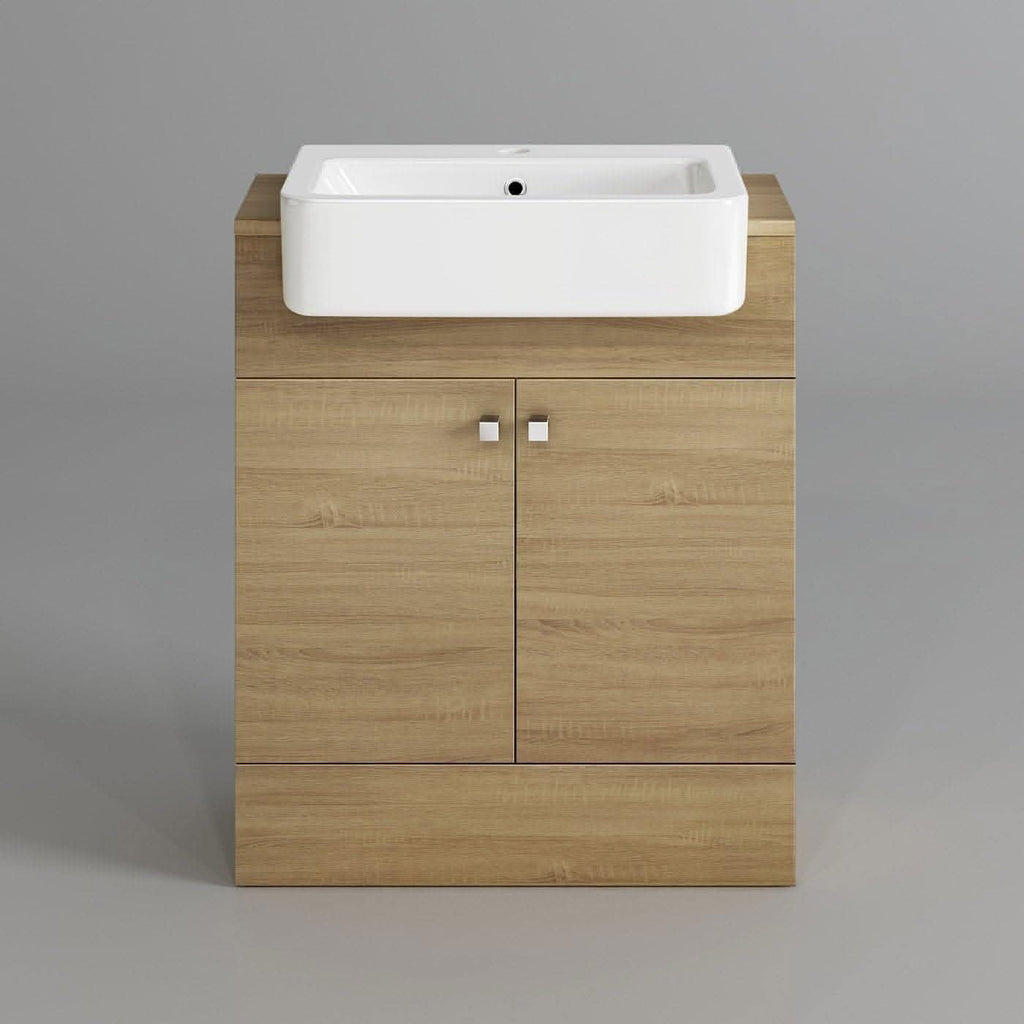 The Harper 2 Door Floorstanding Vanity Unit With Semi Recessed Basin (660mm x 800mm) by iBathUK features a light wood cabinet with square metal handles and two doors, topped with a white semi recessed basin, set against a plain gray background.