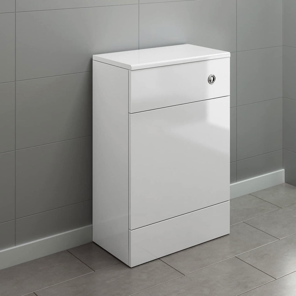 The iBathUK Harper Back To Wall WC Unit features a modern, white rectangular design with a gloss finish and minimalist style, making it ideal for a sleek bathroom upgrade. It stands against gray tiles and includes a top drawer with lock.
