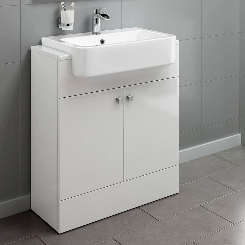 The iBathUK Harper 2 Door Floorstanding Vanity Unit with Semi Recessed Basin (660mm x 800mm) stands against a gray tiled wall and floor, featuring a chrome faucet and wall-mounted toothbrush holder next to the sink.