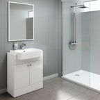 Modern bathroom with gray tiled walls and floors, a Harper 2 Door Floorstanding Vanity Unit With Semi Recessed Basin (660mm x 800mm) by iBathUK, illuminated rectangular mirror, and a glass shower with rainfall head.