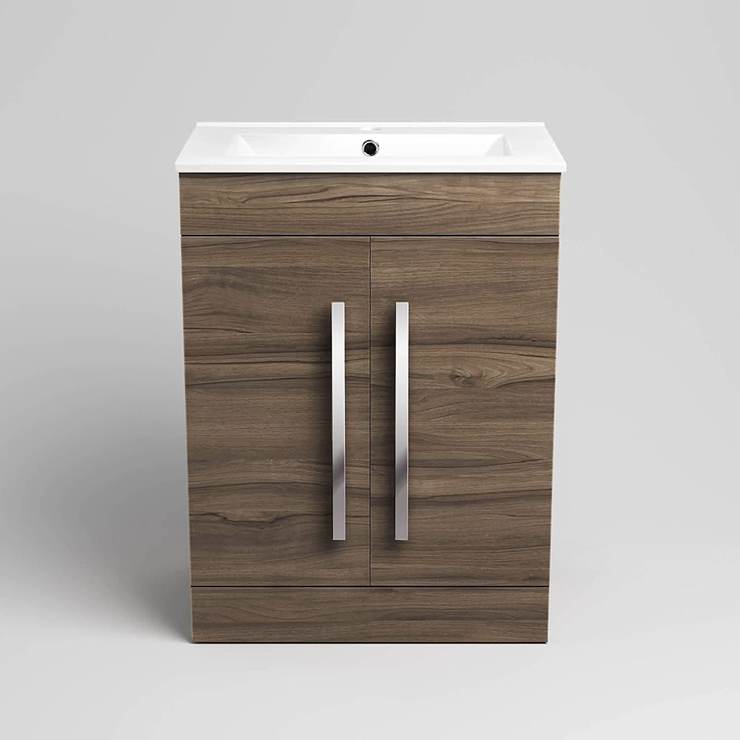 The iBathUK Avon 2 Door Floorstanding Vanity Unit With Basin (615mm x 815mm, 1 Tap Hole) features a white basin on a wooden cabinet with vertical metal handles, creating a modern and stylish bathroom focal point.